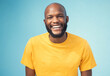 © D Lahoud/peopleimages.com - Black man, portrait or laughing on blue background, isolated mockup or wall mock up at comic, funny or comedy joke. Smile, happy face or student in trendy, cool or stylish fashion clothes on backdrop