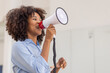 © David - Business black african woman shouting on the megaphone. making Comment, reply, fail, notice and announcement, advertising, screaming Speech and announce concept