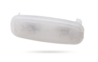 A  transparent plastic shade for illuminating the interior on a white isolated background in a photo studio - spare parts for repairing a car interior or for sale in a auto service.