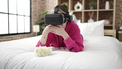 Poster - Young blonde woman watching movie by virtual reality glasses at bedroom