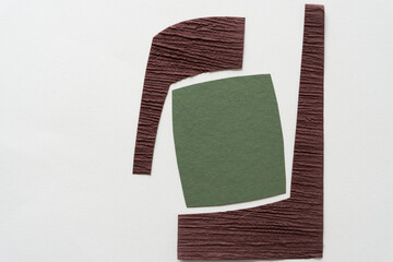 Sticker - two brown border shapes and green paper tile