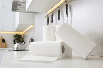 Wall Mural - Rolls of paper towels on white countertop in kitchen