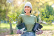 © Nicholas F/peopleimages.com - Plants, gardening and woman volunteering for agriculture, growth project and sustainability on earth day. Park, natural environment and community service worker, farmer or person with trees in forest