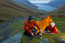 Couple Camping On The Way Up To Scafell Pike In The Lake District