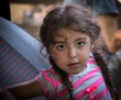 © Cavan Images - girl with braids in a car
