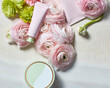 © Cavan Images - Still life with beauty products and roses