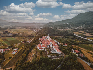 Wall Mural - Small medieval town on the hill top in vintage colors.