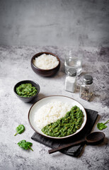 Wall Mural - Spinach dahl with rice in a plate