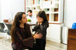 © AntonioDiaz - Mother comforting her little daughter while at the doctor's office