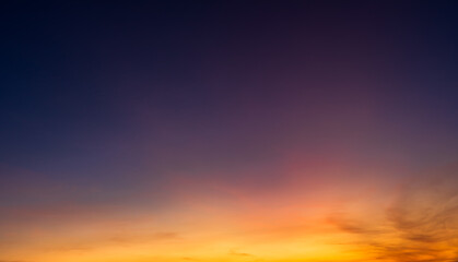 Wall Mural - sunset sky in the evening on twilight with orange sunlight clouds, dusk sky background