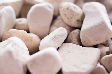 Macro photo decoration garden stones. white stones background