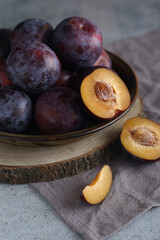 Poster - A bowl with ripe plums