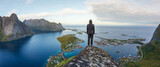 Fototapeta Do pokoju - Hiker enjoying the view over Reinefjorden, Lofoten, Norway