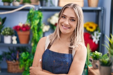 Sticker - Young caucasian woman florist smiling confident standing with arms crossed gesture at florist