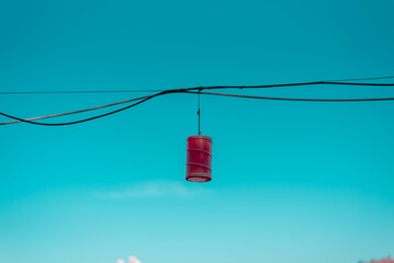 red lantern on blue sky background