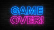© Vitalii - Game over neon text with a brick wall background. Design template, modern trend design night neon signboard, night bright. Advertising light banner. Light art.