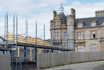 Wall Mural - Scaffolding surrounding house development for safe access to construction work