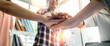 © Yingyaipumi - Panoramic Teamwork,empathy,partnership and Social connection in business join hand together concept.Hand of diverse people connecting.Power of volunteer charity work, Stack of people hand.