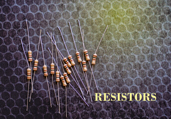 Resistors are electronic devices that control the amount of current and voltage between two points in a circuit. Soft and selective focus.