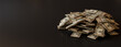 © RocknRoller Studios - Bundled Cash Stacked up on a Black surface with copy-space. Banking concept with Ten Dollar Bills.