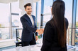 © Westend61 - Smiling recruiter doing handshake with candidate after interview at office