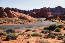 Road Winding Through The Rocky Desert Landscape