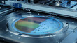 Semiconductor Wafer after Dicing Process. Silicon Dies are Being Extracted by Pick and Place Machine. Computer Chip Manufacturing. Packaging Process.