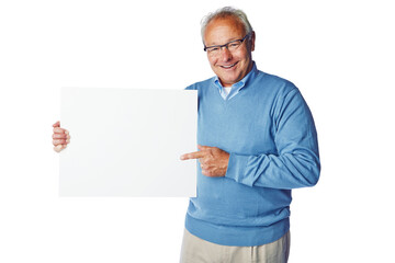 Wall Mural - A confident cheerful senior standing and holding and pointing at a blank pla card or a banner as promoting or recommending at a copy space isolated on a png background.