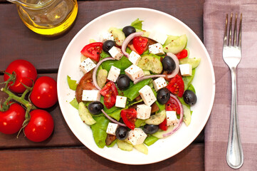 Greek salad with fresh vegetables closeup