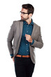 An professional male model in business denims and glasses looking back with his hand in his back pocket isolated on a png background.