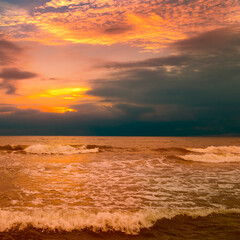 Wall Mural - Beautiful sunrise over the sea and dramatic clouds