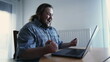 © Marco - Happy man in front of computer receiving excellent news celebrates. Excited male entrepreneur looking at laptop feeling excitement