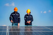 © FotoArtist - Technology solar cell, Engineer service check installation solar cell on the roof of factory. technician checks the maintenance of the solar panels