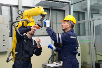 Analyzing Machine Failures in a Production Process. Robotics research and development team having a meeting