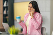 © ivanko80 - Smiling female freelancer working at home