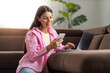 © ivanko80 - Woman working with her laptop at home