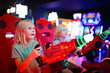 Little Kids Playing Shooting Game Challenge at Video Arcade