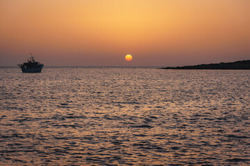 Wall Mural - Sunset in Coral Bay resort in Pegeia city, Cyprus island country