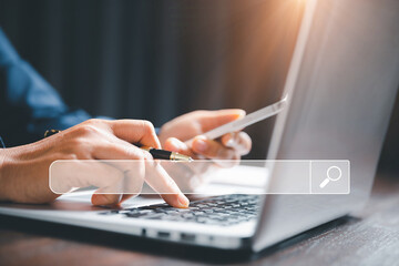 search engine optimization seo, data searching technology. business hands typing on laptop computer 