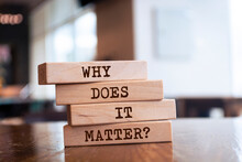 Wooden Blocks With Words 'Why Does It Matter?'.
