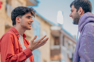 young friends on the street talking