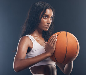 Wall Mural - Basketball player, sports training and studio woman for wellness challenge, practice game or fitness competition. Performance workout, health exercise and athlete model isolated on dark background