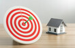 © Deemerwha studio - arrow on the center of the dartboard for target planning and manage to buy a house to success building. home purchase planning goals dream.