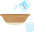 米と水の入った計量カップ、水加減