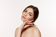 © master1305 - Portrait of young beautiful woman with perfect smooth skin isolated over white background. Tender feminine attraction. Concept of natural beauty, plastic surgery, cosmetology, cosmetics, skin care.