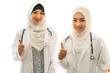 © Art_Photo - Professional medical two muslim asian woman doctor team with stethoscope in uniform working and look at camara in hospital.healthcare and medicine