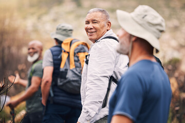 Hiking, nature and senior friends on mountain for fitness, trekking and backpacking adventure. Explorer, discovery and expedition with group of old men on trail for health, retirement and journey