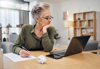 Canvas Print - Focus, planning and senior woman on laptop writing, work from home budget or financial strategy. Person thinking, reading debt and pension document or insurance paperwork, taxes or finance investment