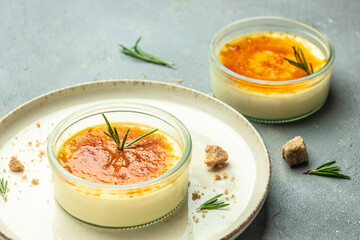 two delicious cream brulee or brule, traditional french vanilla cream dessert with caramelised sugar