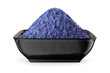 Butterfly pea flower powder or blue matcha in black bowl isolated on white. Front view.